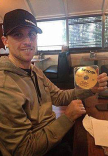 Denny Hamlin holding DJ Spider Harrison's record.